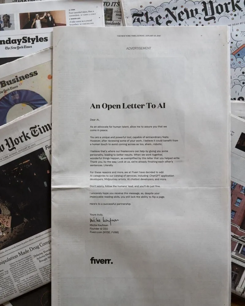New York Times Sunday edition showing Fiverr’s full-page ad “An Open Letter To AI,” signed by CEO Micha Kaufman.